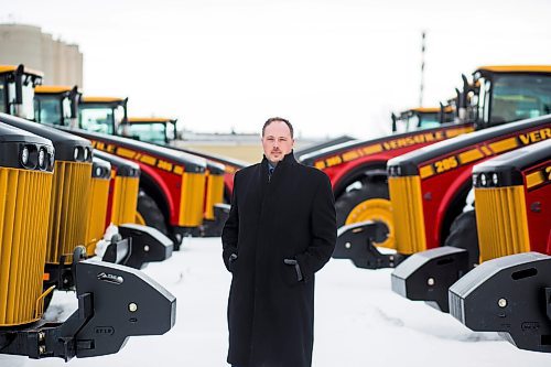 MIKAELA MACKENZIE / WINNIPEG FREE PRESS

Adam Reid, sales and marketing vice president for Buhler/Versatile, poses for a portrait with Versatile tractors in Winnipeg on Monday, March 18, 2019. Buhler recently partnered with Japanese tractor company Kubota, and will make larger horsepower tractors for Kubota.

Winnipeg Free Press 2019.