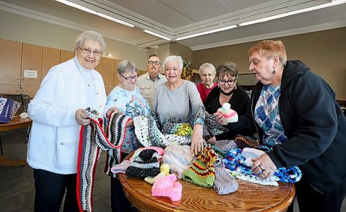 RUTH BONNEVILLE / WINNIPEG FREE PRESS

PHILANTHROPY

Group photo of Ann-Marie Sellers (centre white hair, grey sweater), founder of Community Helpers with her group of helpers that create handmade items for the needy.  



Story: For the Philanthropy Page. Community Helpers is a group created in 2015 with members from two adjoining apartment buildings in St. Vital. Members do everything from fundraisers, to food and water drives, growing fresh vegetables to give away, looming, crocheting and knitting hats and mats for those who need them. They&#x576;e connected with numerous agencies in the city and made donations to Siloam Mission, the Bear Clan, Koats for Kids, Agape Table and many others.



 
Feb 25th, 2022
