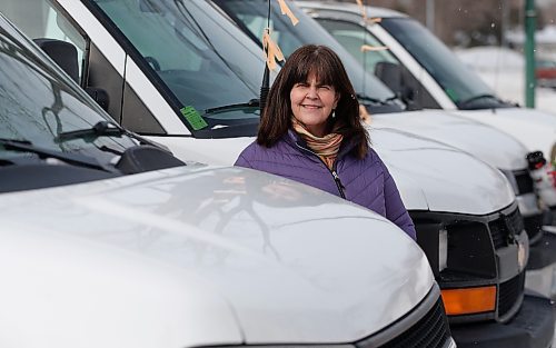 JOHN WOODS / WINNIPEG FREE PRESS
Carol Jones, executive director of Little People&#x2019;s Place Daycare, is photographed with her vandalized childcare vans Tuesday, March 8, 2022. The childcare staff discovered that the gas tanks of their three vehicles were drilled and drained.