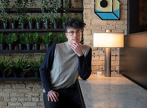 JESSICA LEE / WINNIPEG FREE PRESS

Filmmaker Damien Ferland poses for a portrait on March 8, 2022 at a cafe in the Exchange District.

Reporter: Randall


