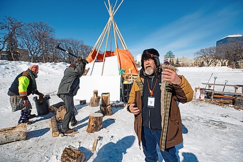 MIKE DEAL / WINNIPEG FREE PRESS
Medicine man, Jerome Desilets, talks about what structures were removed at the peace camp on Memorial Park.
The people at the two peace camps that have been on the grounds of the Manitoba Legislative building were confronted by Provincial Security officers around 7 a.m. Wednesday morning. The officers had bulldozers with them and they dismantled structures on both camps only stopping when occupiers were forced to throw themselves in front of the heavy machinery.
One of the camps which has had a sacred fire burning for almost a year on the east side of the building had several of their tents destroyed including their kitchen which held donated foods for the fire keepers. The other camp in Memorial Park, which has been around since September, but grew larger during the convoy protest had a few structures bulldozed and removed.
See Codey Sellar story
220309 - Wednesday, March 09, 2022.