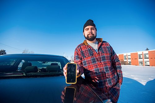 MIKAELA MACKENZIE / WINNIPEG FREE PRESS

Brett Parkin, who hasn&#x2019;t driven for SkipTheDishes for three weeks because of gas prices, poses for a portrait with his car in Winnipeg on Wednesday, March 9, 2022. For Gabby story.
Winnipeg Free Press 2022.