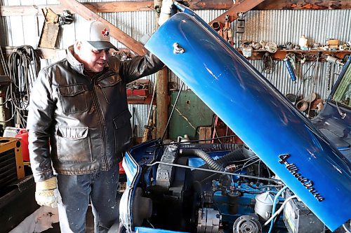 Camile Gofflot pops the hood on his 1958 Willys Jeep Truck on Wednesday morning, showcasing the original six-cylinder, &quot;Super Hurricane&quot; engine that lies within. (Kyle Darbyson/The Brandon Sun)