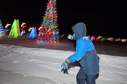 10032022
Carver Strahl skates at the Brandon Skating Oval with family on a windy and unseasonably cold Thursday evening. (Tim Smith/The Brandon Sun)