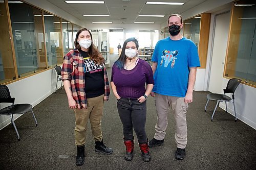 MIKE DEAL / WINNIPEG FREE PRESS
Graduates of the Fearless R2W&#x2019;s community safety host program (from left), Landa Rispler, Julien Malik, and John Bur.
A graduation ceremony took place in the Millennium Library Friday morning.
The new Community Safety Host's have become certified security guards and have learned first aid, psychological first aid, harm reduction and how to become family advocates.
The safety hosts will do work placements in libraries in the North End and St. Boniface.
220311 - Friday, March 11, 2022.