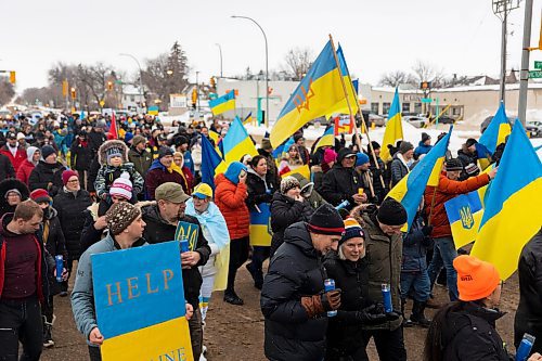 Brandonites march in support of Ukraine down 18th street Saturday. The rally saw hundreds meet at Brandon University and make their way to Brandon City Hall. (Chelsea Kemp/The Brandon Sun)