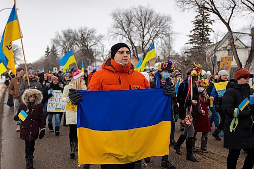 Brandonites march in support of Ukraine down 18th street Saturday. The rally saw hundreds meet at Brandon University and make their way to Brandon City Hall. (Chelsea Kemp/The Brandon Sun)