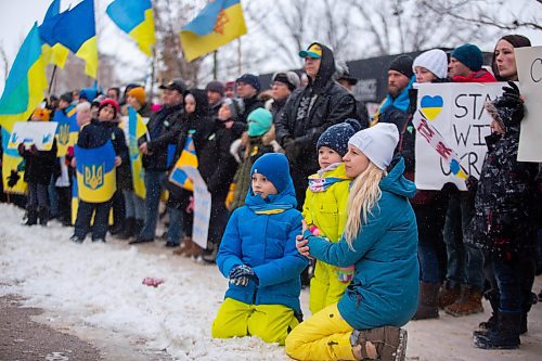 Brandonites listen to speakers in support of Ukraine Saturday at Brandon City Hall. (Chelsea Kemp/The Brandon Sun)