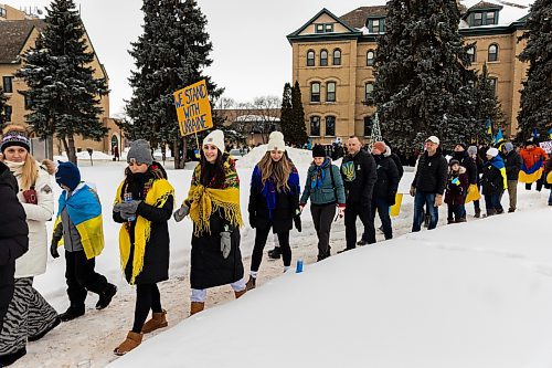 Brandonites march in support of Ukraine on Saturday. The rally saw hundreds meet at Brandon University and make their way to Brandon City Hall. (Chelsea Kemp/The Brandon Sun)