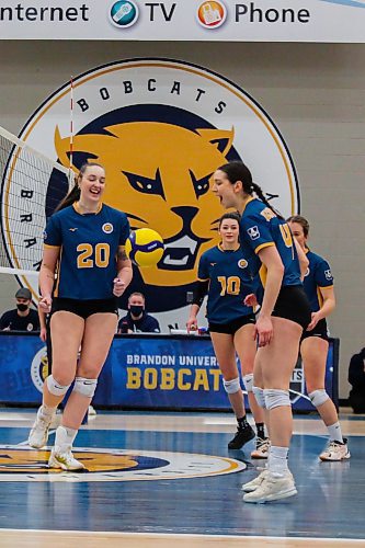 Brandon University Bobcats celebrate a point against the University of Regina Cougars in a Canada West women&#x573; volleyball game at the Healthy Living Centre Saturday. (Chelsea Kemp/The Brandon Sun)