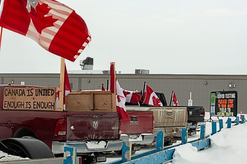 Freedom Convoy protesters park at the COVID-19 testing site located at the Manitoba Emergency Services College Parking lot Saturday. (Chelsea Kemp/The Brandon Sun)