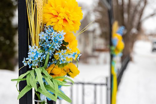 Flowers tied to the gate of the Holy Ghost Ukrainian Orthodox Church Sunday. In response to the Russian invasion of the country the Ukrainian Orthodox Church of Canada has blessed all churches to be active centres of prayer and &#x4a8;avens for the storm-tossed&#x4e0;to provide solace to communities. (Chelsea Kemp/The Brandon Sun)