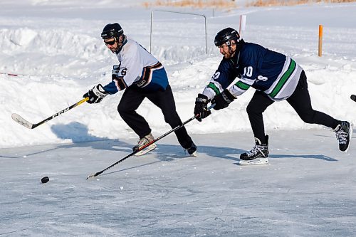 The Leftover Barleys take on the Reston River Rounds at the Rink The River Shinny Tournament  Saturday in Souris. (Chelsea Kemp/The Brandon Sun)