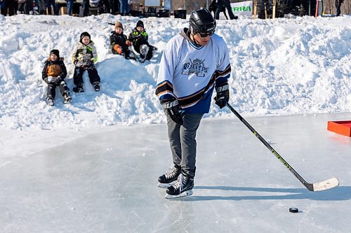 Players compete in the Rink The River Shinny Tournament  Saturday in Souris. (Chelsea Kemp/The Brandon Sun)