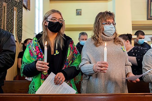 Diana, left, and Svitlana Lupanchuk attend a prayer service in support of Ukraine at the Holy Ghost Ukrainian Orthodox Church Sunday. In response to the Russian invasion of the country the Ukrainian Orthodox Church of Canada has blessed all churches to be active centres of prayer and &#x4a8;avens for the storm-tossed&#x4e0;to provide solace to communities. (Chelsea Kemp/The Brandon Sun)
