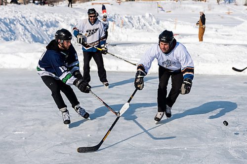 The Leftover Barleys take on the Reston River Rounds at the Rink The River Shinny Tournament  Saturday in Souris. (Chelsea Kemp/The Brandon Sun)