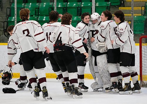 JOHN WOODS / WINNIPEG FREE PRESS
St Paul&#x2019;s Crusaders celebrate defeating the Westwood Warriors in the Manitoba Provincial AAAA Championship game in Selkirk Monday, March 14, 2022. St Paul&#x2019;s defeated Westwood 6-2 for the championship.