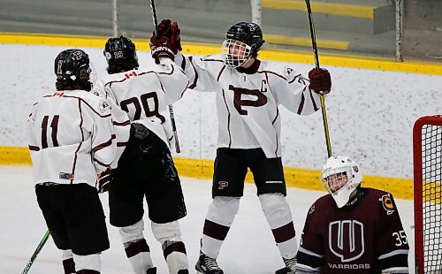 JOHN WOODS / WINNIPEG FREE PRESS
St Paul&#x2019;s Crusaders&#x2019; Jack Feeters (11), Elliot Lewis (29) and Jonah Norman (21) celebrate Lewis&#x2019; goal against the Westwood Warriors&#x2019; in the Manitoba Provincial AAAA Championship game in Selkirk Monday, March 14, 2022. St Paul&#x2019;s defeated Westwood for the championship.