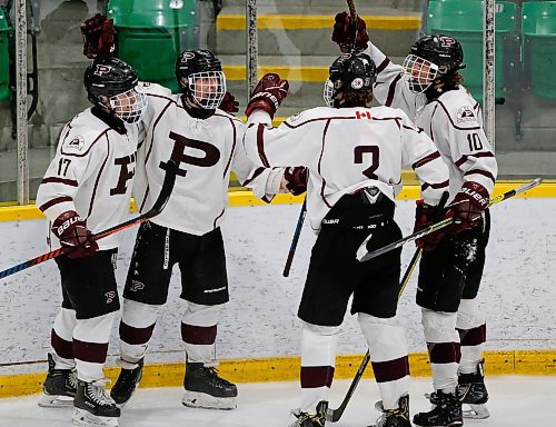 JOHN WOODS / WINNIPEG FREE PRESS
St Paul&#x2019;s Crusaders celebrate Cole McCullough&#x2019;s (6), second left, goal against the  Westwood Warriors in the Manitoba Provincial AAAA Championship game in Selkirk Monday, March 14, 2022. St Paul&#x2019;s defeated Westwood for the championship.