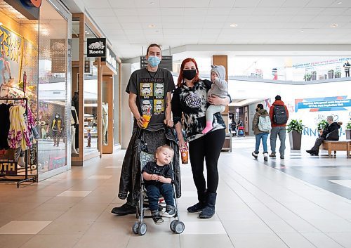 JESSICA LEE / WINNIPEG FREE PRESS

Logan and Cora Hanson, with children Kayden, 2, and Amelia, 1, are photographed at Polo Park March 15, 2022, the first day the mask mandates have been removed.

Reporter: Chris


