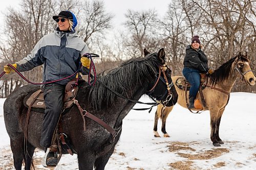 Amanda Leitner, left, and Krystyn Gillies help guests try out skijoring during a fundraiser at Turtle Mountain Bible Camp Saturday. (Chelsea Kemp/The Brandon Sun)