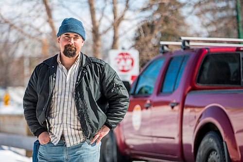 MIKAELA MACKENZIE / WINNIPEG FREE PRESS

William Belford, fleet manager for Peg City Car Co-op, poses for a portrait with the truck that had gas siphoned out of the tank in Winnipeg on Wednesday, March 16, 2022. For Erik story.
Winnipeg Free Press 2022.