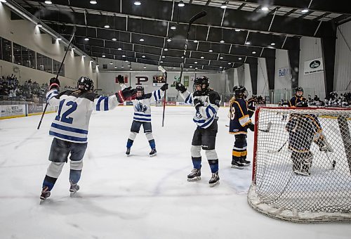 JESSICA LEE / WINNIPEG FREE PRESS

Coll&#xe8;ge Jeanne-Sauv&#xe9; players celebrate after Annika Devine (12) scores the first goal. J.H. Bruns won the second game out of three against Coll&#xe8;ge Jeanne-Sauv&#xe9; 3-2 during the second finals game on March 16, 2022. The final game will determine the high school women&#x2019;s hockey team.

Reporter: Taylor


