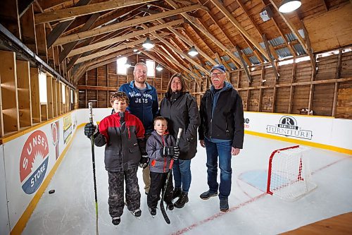 MIKE DEAL / WINNIPEG FREE PRESS
Dave and his wife Lora with his father Eric and kids, Sam (left) and Matt (right).
Dave Rawlings converted a barn on his property, with the help of his father Eric, into an indoor mini-skating rink. Including a heated change room. When the pandemic hit his kids, Sam and Matt, were able to skate almost everyday even during the worst lockdown stages.
See Ben Waldman story
220316 - Wednesday, March 16, 2022.
