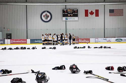 JESSICA LEE / WINNIPEG FREE PRESS

Coll&#xe8;ge Jeanne-Sauv&#xe9; won the women&#x2019;s high school hockey championship against J.H. Bruns (3-0) on March 17, 2022 during the third finals game. The J.H. Bruns players gather after the trophies are awarded.

Reporter: Taylor


