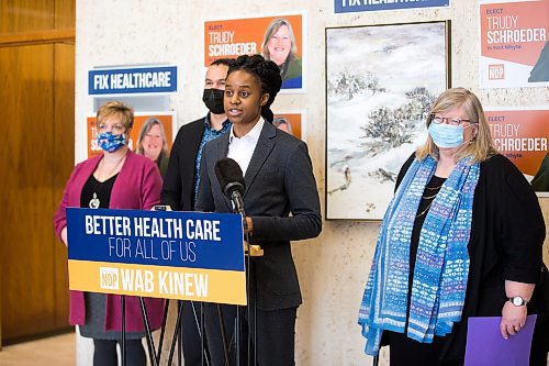 MIKAELA MACKENZIE / WINNIPEG FREE PRESS

NDP MLA Uzoma Asagwara speaks about health care cuts as NDP MLA Lisa Naylor (left), NDP Leader Wab Kinew, and NDP Fort Whyte candidate Trudy Schroeder listen at the NDP Fort Whyte campaign office in Winnipeg on Friday, March 18, 2022.  For Danielle Da Silva story.
Winnipeg Free Press 2022.