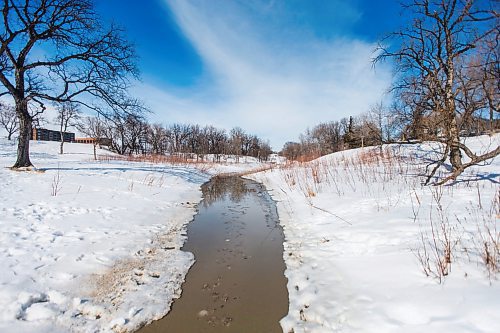 MIKAELA MACKENZIE / WINNIPEG FREE PRESS

Omand's Creek (where raw sewage was spilled after snowmelt overwhelmed construction being done to replace a combined sewer interceptor pipe) in Winnipeg on Friday, March 18, 2022.  For Kevin story.
Winnipeg Free Press 2022.