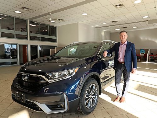 Kent Forman, Dealer Principal of Forman Honda and Forman Mazda said models like their 2022 Honda CR-V shown beside him have been hard to come by due to a crunch in supply and a high demand from customers. (Joseph Bernacki/The Brandon Sun)