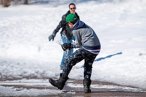 Daniel Crump / Winnipeg Free Press. Dave Hunter and his son, Liam Connolly, have a snowball fight on a warm Saturday morning at the Forks in Winnipeg. &#x497;e weren&#x574; able to on the river trail this winter, because of his [Liam&#x573;] hockey schedule this year so we thought we come enjoy the warm weather today,&#x4e0;Hunter said. March 19, 2022.