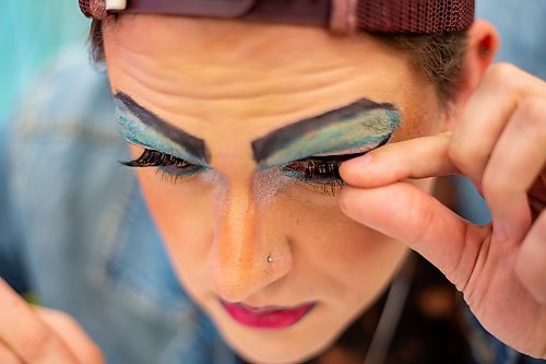 Cory Kukurudz applies eyelashes during a drag workshop at the Art Gallery of Southwestern Manitoba led by local performer Flora Hex Saturday. (Chelsea Kemp/The Brandon Sun)