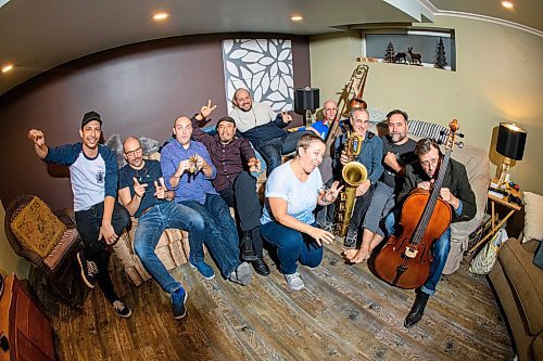 Mike Sudoma / Winnipeg Free Press

10 piece Latin Party Band, Papa Mambo, take a break after practice Sunday evening as they prepare for the bands 30th anniversary show this Saturday, October 11 at X-Cues Billiards and Cafe.

October 6, 2019