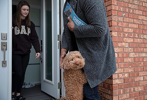 JESSICA LEE / WINNIPEG FREE PRESS

Fort Whyte candidate Obby Khan is greeted by Copper the dog while visiting a friend during his campaign on March 21, 2022 in the Linden Woods neighbourhood.

Reporter: Carol


