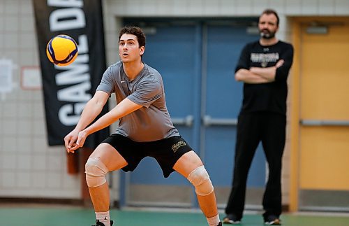 JOHN WOODS / WINNIPEG FREE PRESS
University of Manitoba Bison Owen Schwartz as coach Arnd Ludwig looks on during practice at the university Monday, March 21, 2022. The team will be in U Sports men&#x573; volleyball national championships this weekend.

Re: Allen