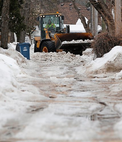 JOHN WOODS / WINNIPEG FREE PRESS
City crews were out clearing residential back lanes in Crescentwood Tuesday, March 22, 2022. The city received many complaints citywide about lane conditions.

Re: ?