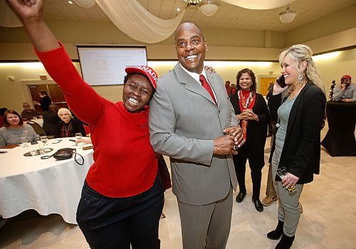 JOHN WOODS / WINNIPEG FREE PRESS
Willard Reaves and a supporter celebrate a lead in a by-election in Fort Whyte Tuesday, March 22, 2022. 

Re: Carol
