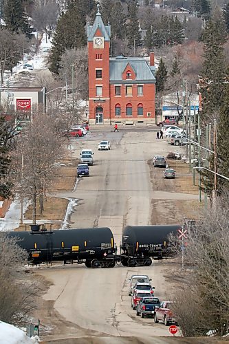 24032022
A train passes through Minnedosa, Manitoba on a grey and windy Thursday. (Tim Smith/The Brandon Sun)