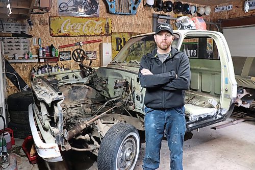 James Cooke poses for a photo in front of his 1974 Chevrolet short box truck on Thursday afternoon in Brandon. The 38-year-old is drawing upon all his experience working in automotive collision repair to bring this truck back from the brink. (Kyle Darbyson/The Brandon Sun)