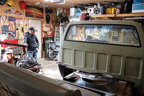 James Cooke takes stock of his 1974 Chevrolet truck on Thursday afternoon, telling the Sun during a tour of his garage that he's hoping to turn this shell into a well-oiled recreational vehicle in the near future. (Kyle Darbyson/The Brandon Sun) 