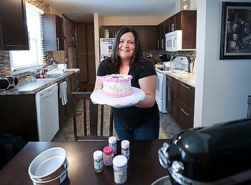 RUTH BONNEVILLE / WINNIPEG FREE PRESS

Volunteer - Cakes for Kids

Photo of Dayna Olson who volunteers her time with Cakes for Kids Winnipeg. She bakes birthday cakes for children who would not otherwise get one. 

Aaron Epp 

March 24th,  2022
