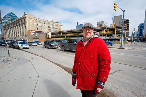 MIKE DEAL / WINNIPEG FREE PRESS
Historian Christian Cassidy outside The Bay Parkade at 450 Portage Avenue, Friday afternoon.
see Brenda Suderman story
220325 - Friday, March 25, 2022.