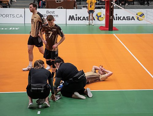 JESSICA LEE / WINNIPEG FREE PRESS

Bisons player Matthew Campbell (14) suffers an injury during the semi-finals game. University of Manitoba Bisons men&#x2019;s volleyball team played against Trinity Western University on March 25, 2022 at the IG Athletic Centre.

Reporter: Mike S.



