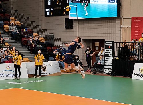JESSICA LEE / WINNIPEG FREE PRESS

Trinity Western University player Isiah Olfert (4) serves a ball during a semi-finals game. University of Manitoba Bisons men&#x2019;s volleyball team played against Trinity Western University on March 25, 2022 at the IG Athletic Centre.

Reporter: Mike S.