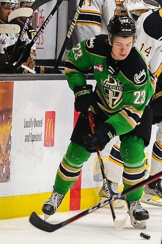 Prince Albert Raiders Sloan Stanick takes on the Brandon Wheat Kings in a Western Hockey League game Friday at Westoba Place. (Chelsea Kemp/The Brandon Sun)