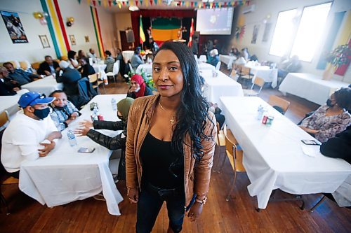 JOHN WOODS / WINNIPEG FREE PRESS
Kidist Demessie, who came to Winnipeg thirteen years ago from Ethiopia, attends an International Women&#x573; Day event at the Ethiopian Cultural Centre on Selkirk Sunday, March 27, 2022. Demessie produces videos and other content to help Ethiopians settle in Winnipeg. The event is to raise funds for menstrual products.