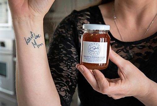 JESSICA LEE / WINNIPEG FREE PRESS

A special Fancy Infusions pepper jelly which is dedicated to founder Hayley Williams&#x2019; mom who passed away is photographed on March 29, 2022 next to a tattoo Williams has on her wrist of her mom&#x2019;s handwriting.
