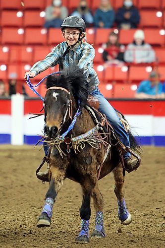 29032022
Adi McKenzie competes in the barrel racing event at the Royal Manitoba Winter Fair on Tuesday evening.
(Tim Smith/The Brandon Sun)